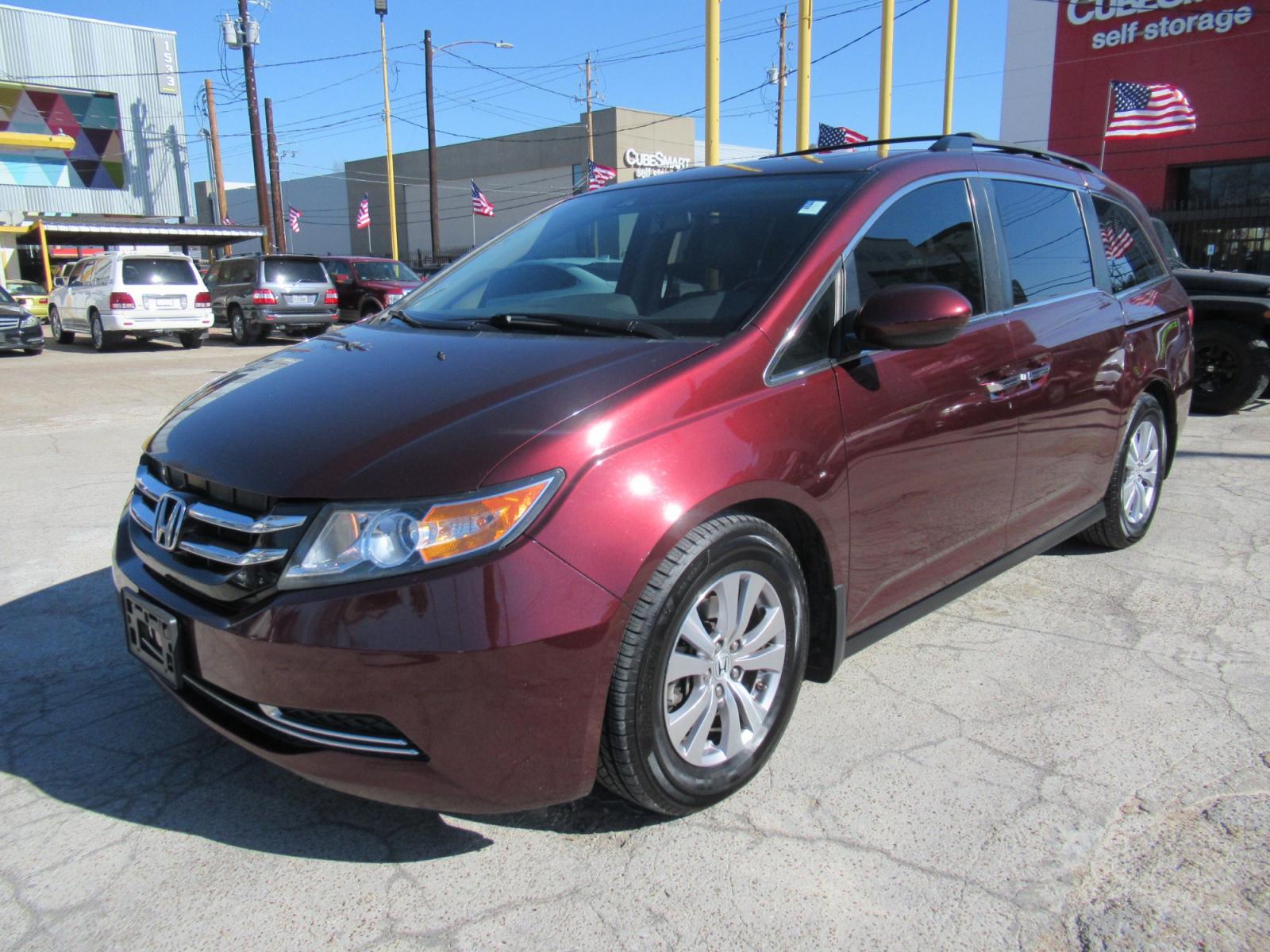 2016 Red /Tan Honda Odyssey EX-L (5FNRL5H62GB) with an 3.5L V6 SOHC 24V engine, Automatic transmission, located at 1511 North Shepherd Dr., Houston, TX, 77008, (281) 657-1221, 29.798361, -95.412560 - 2016 HONDA ODYSSEY EX-L VIN: 5FNRL5H62GB103369 5 F N R L 5 H 6 2 G B 1 0 3 3 6 9 VAN 3.5L V6 F SOHC 24V GASOLINE FRONT WHEEL DRIVE - Photo #29